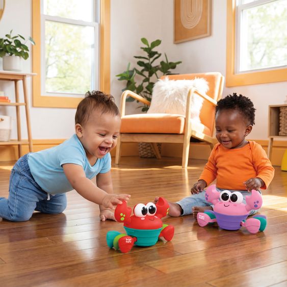 Bright Starts Interaktivel Krabbel- und Musikspielzeug Rockin Crawling Crab mit Musik & Tanzfunktion - Pink