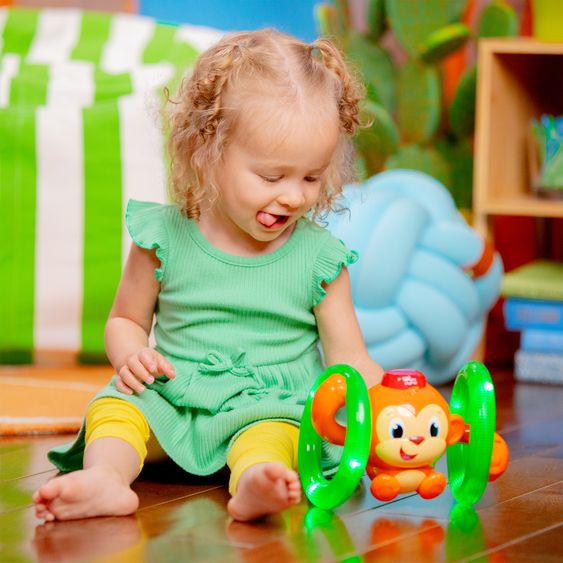 Bright Starts Jouet Musical Roll & Glow Monkey™ Jouet Bébé Interactif avec Lumière, Musique & Mouvement - Multicolore