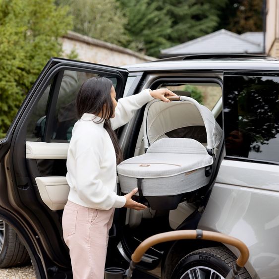 Joie Signature Auto-Babywanne Calmi R129 im Auto und auf den Kinderwagen Vinca, Aeria, Finiti verwendbar inkl. Regenschutz - Signature - Oyster