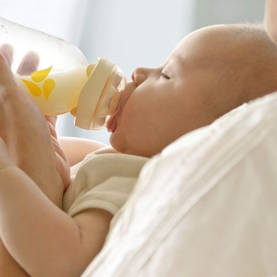 Medela Set di tiralatte Harmony Pump & Feed con Calma e 4 cuscinetti per l'allattamento