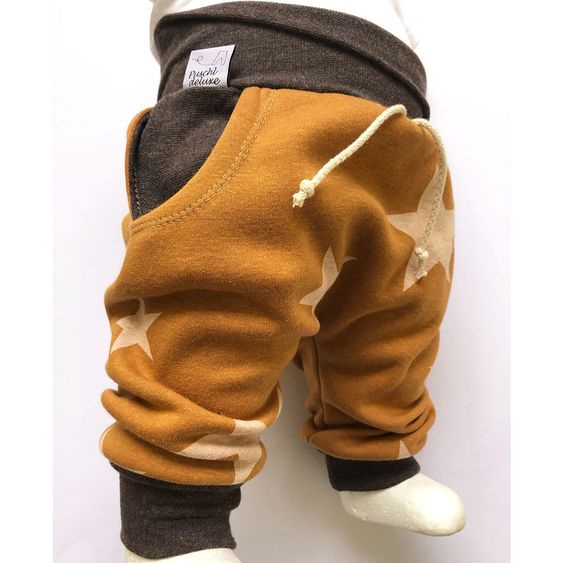 Puschl deluxe Baby Pumphose - Sterne Senf / Braun - Gr. 50/56