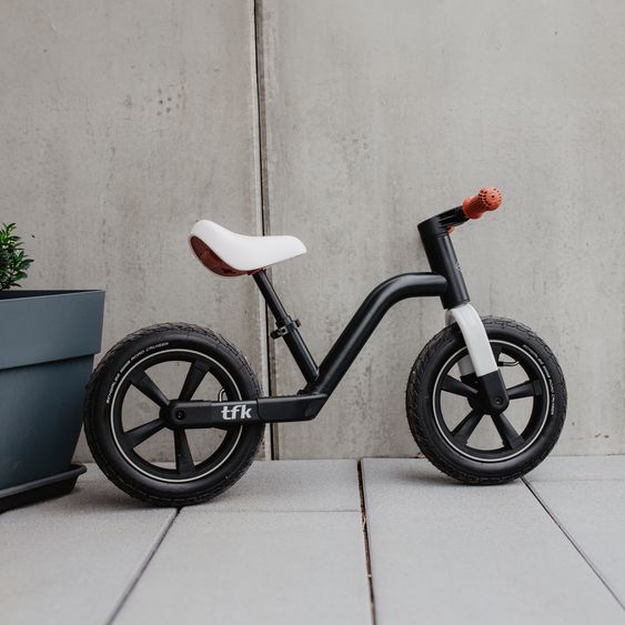 TFK Laufrad Balance Bike mit Luftreifen, Trageschlaufe & verstellbarem Sattel - Rot